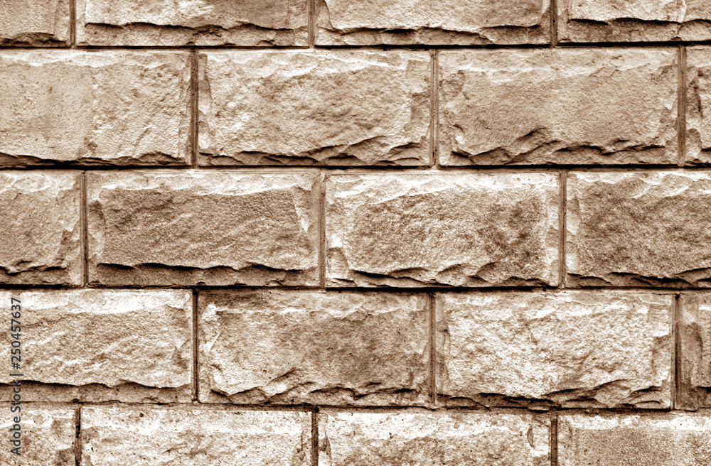 Fototapeta premium Decorative brick wall in brown color.