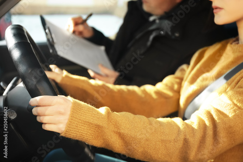 Young woman passing driving license test