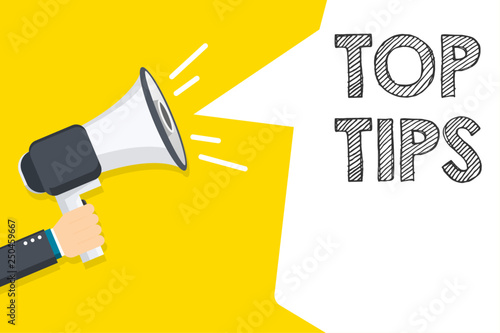 Top Tips speech bubble. Hand holding megaphone with Top Tips text. Hand holding megaphone with open space for your text.