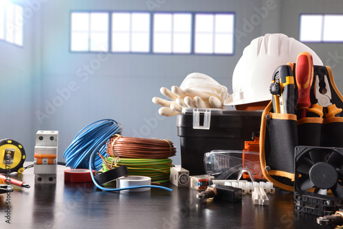 Photography Composition with tools and industrial material with industrial ship background