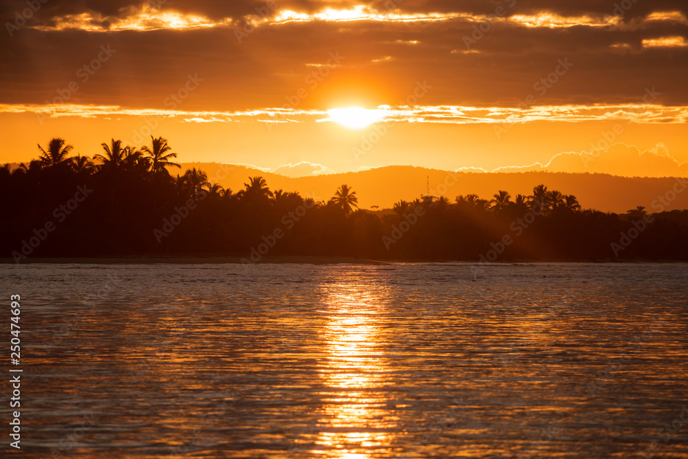 Naklejka premium beautiful sunset on the beach called 