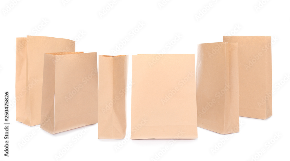 Set of brown paper bags on white background. Mockup for design Set of brown paper bags on white background. Mockup for design