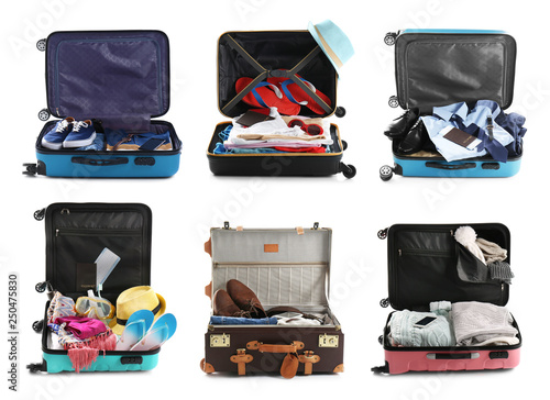Billede på lærred Set of different suitcases packed for travelling on white background