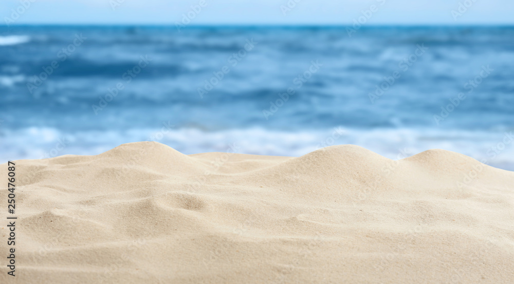 Beautiful view of ocean sand beach on sunny day Beautiful view of ocean sand beach on sunny day