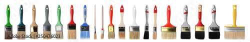 Set of different clean paint brushes on white background