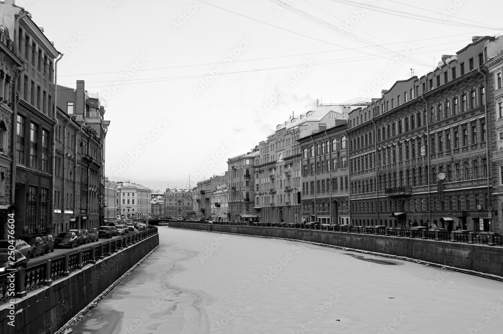 Black and white photograph of the canal in St. Petersburg in winter