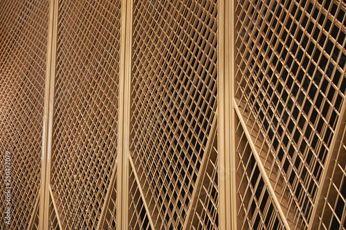 Photography Golden metal construction on dark background. Modern design