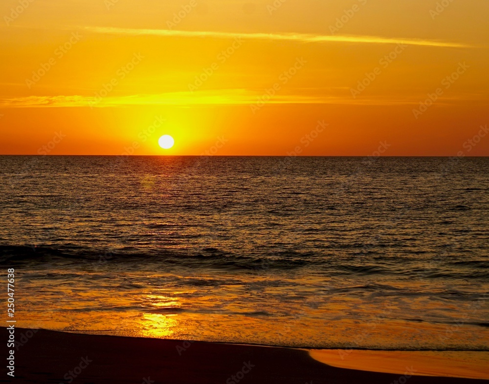Sunset on the sandy shore