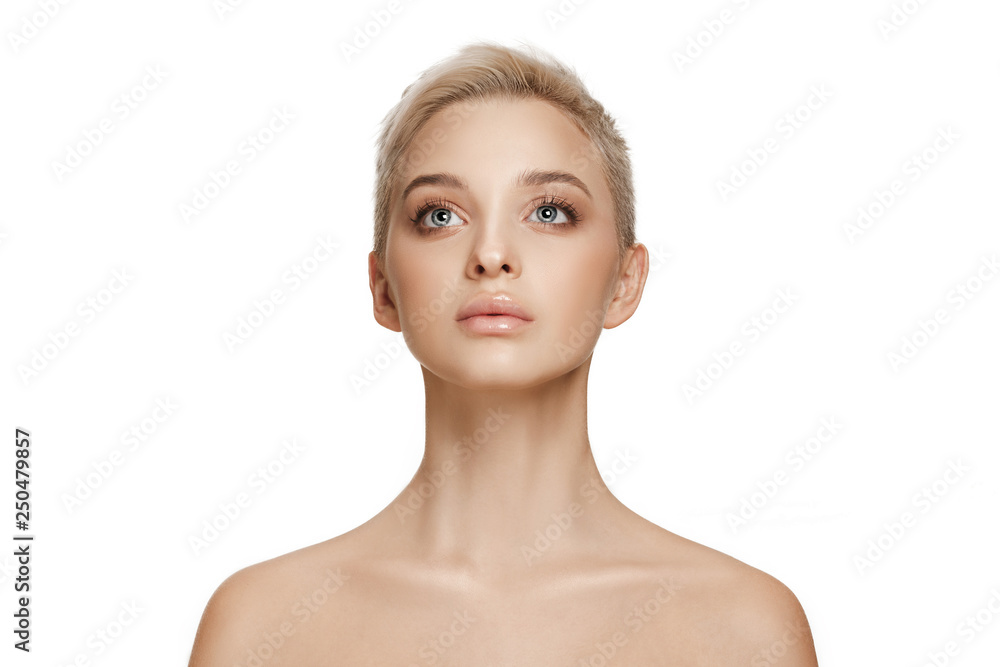 The beautiful female face. The perfect and clean skin of face on white. The beauty, care, skin, treatment, health, spa, cosmetic concept The beautiful female face. The perfect and clean skin of face on white. The beauty, care, skin, treatment, health, spa, cosmetic concept