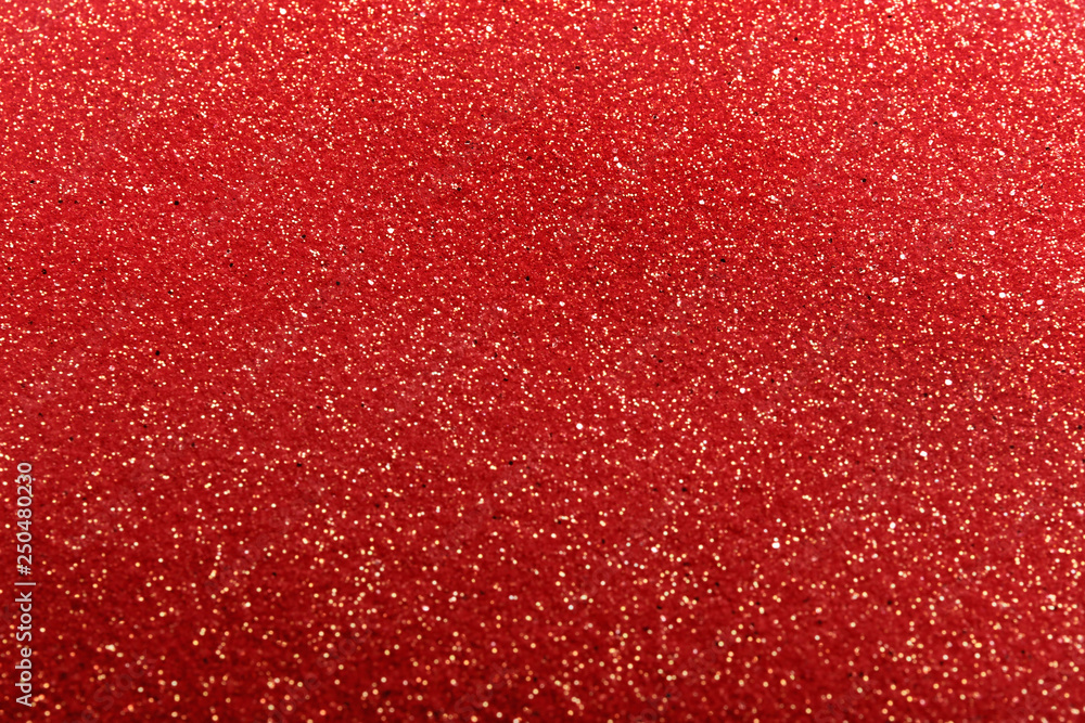 Closeup view of sparkling red glitter background