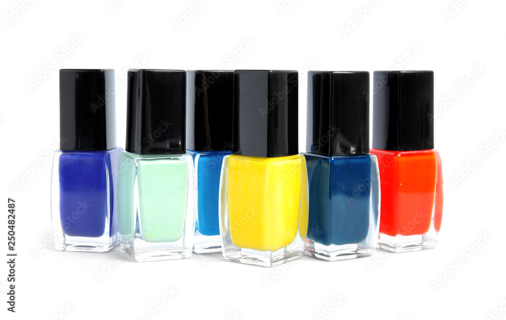 Bottles of nail polish on white background Bottles of nail polish on white background