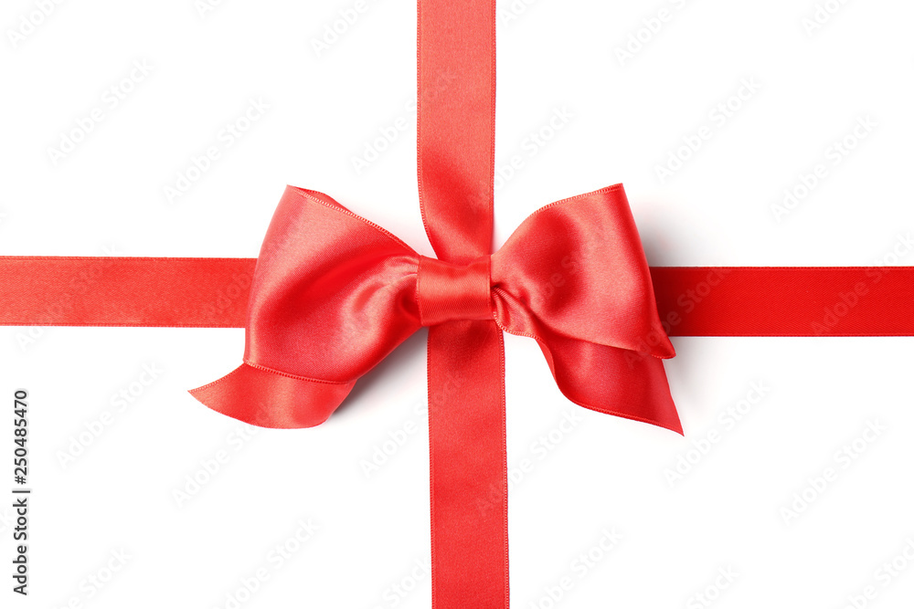 Red ribbon with bow on white background. Festive decoration Red ribbon with bow on white background. Festive decoration