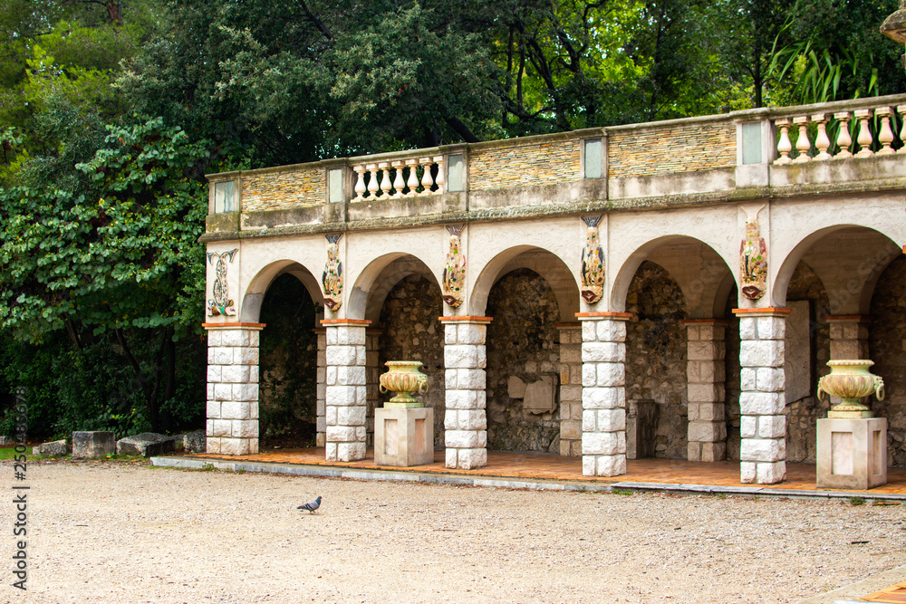 Beautiful archway pavilion decorated with mosaics and vases, Castle Hill, park Colline du Chateau, Nice, Côte d'Azur, France
