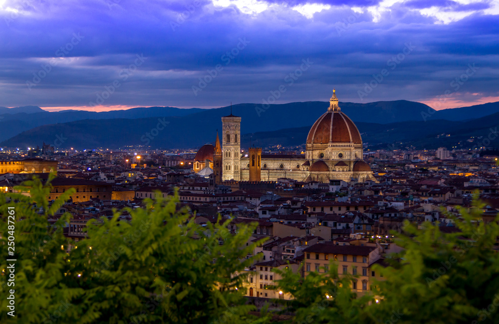The Duomo of Florence Italy just after sunset standing out from the city