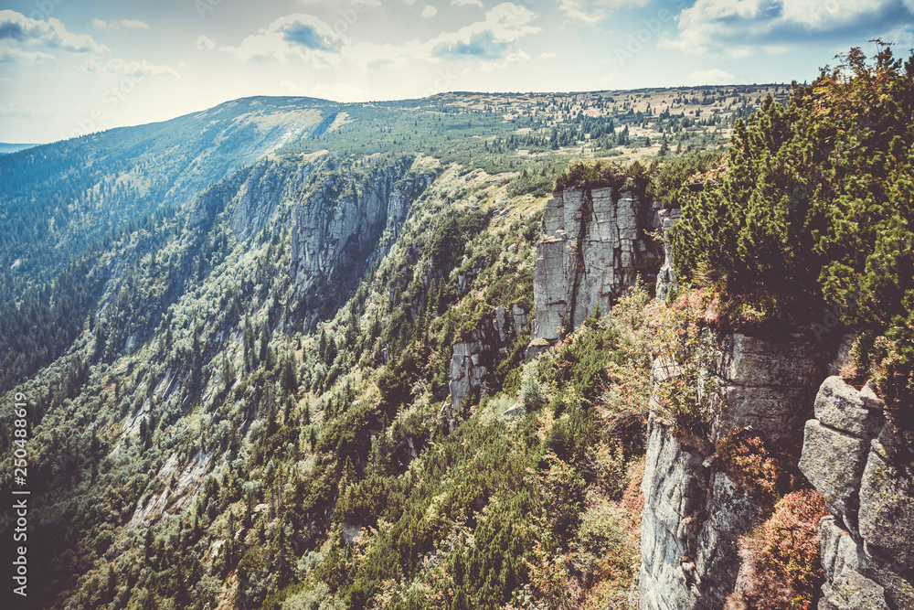 Scenic sight of czech giant mountains valley and rock formation at summer