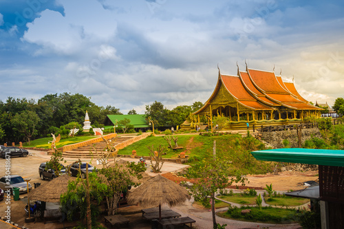 Ubon Ratchathani, Thailand - July 28, 2017: Beautiful landscape and architecture at Wat Sirindhorn Wararam Phu Prao, public temple in Ubon Ratchathani, Thailand, nearby Chong Mek border. photo