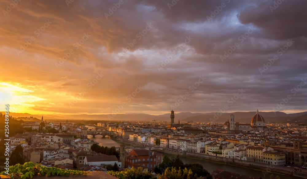A beautiful sunset on a cloudy evening in Florence, Italy