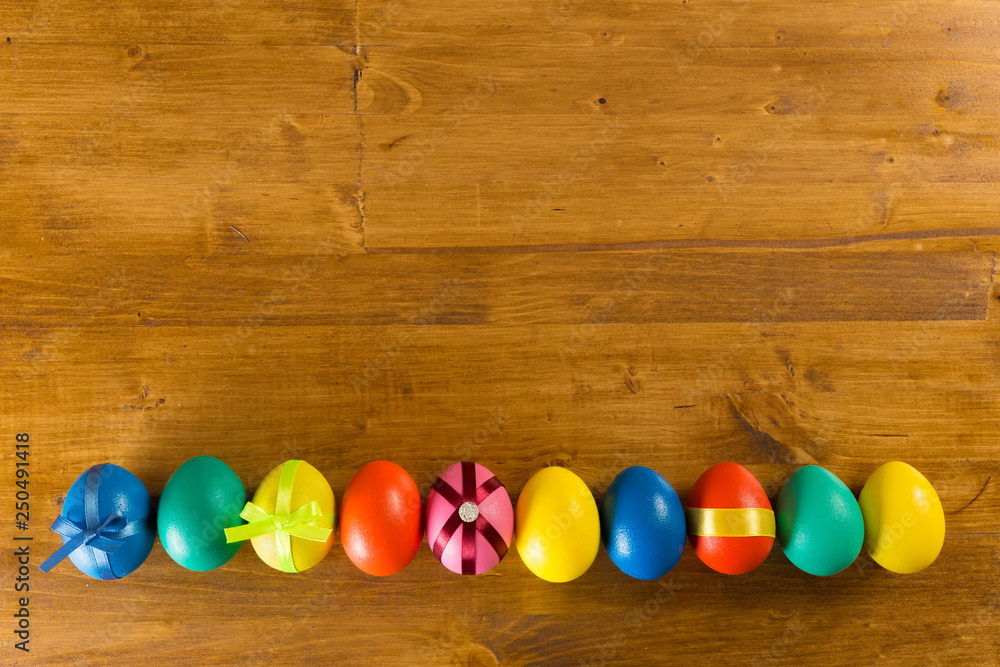 easter eggs on wooden background, top view easter eggs on wooden background, top view
