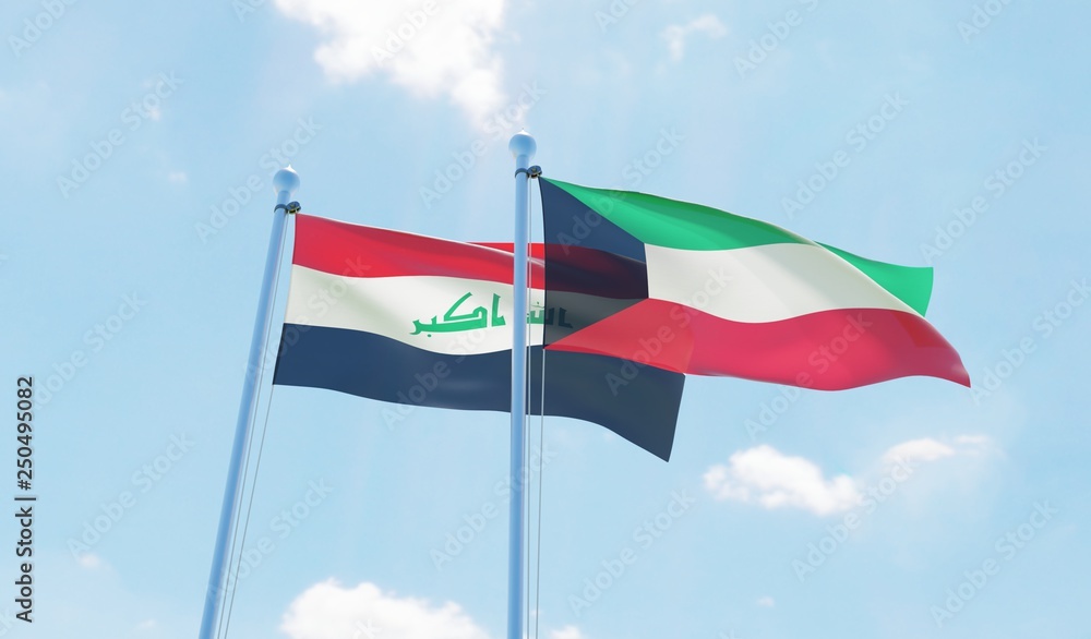 Kuwait and Iraq, two flags waving against blue sky. 3d image