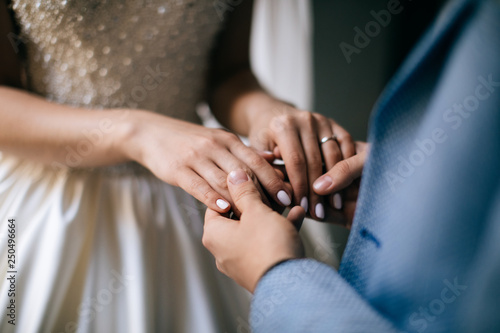 hands of the bride and groom