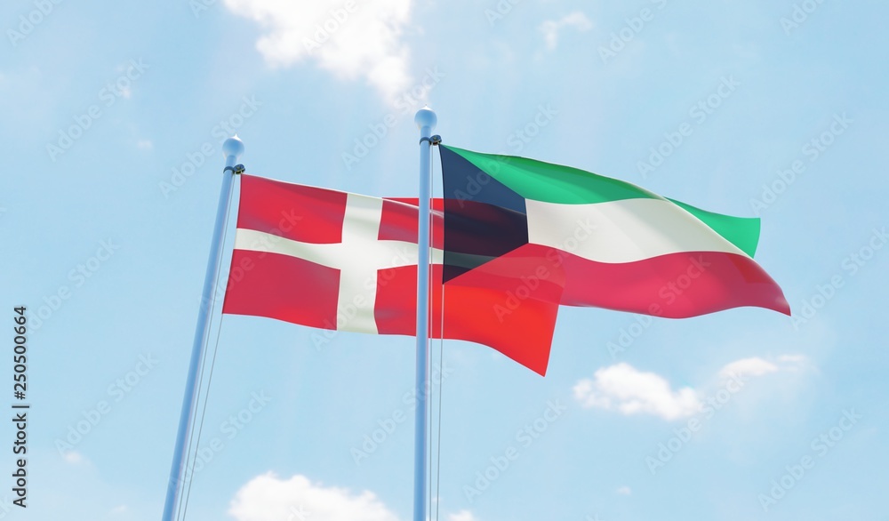 Kuwait and Denmark, two flags waving against blue sky. 3d image Kuwait and Denmark, two flags waving against blue sky. 3d image