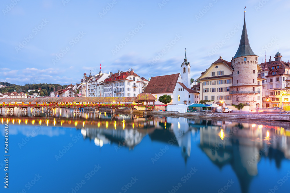 Scenic historic city center of Lucerne with famous buildings and lake Lucerne (Vierwaldstattersee), Canton of Lucerne, Switzerland Scenic historic city center of Lucerne with famous buildings and lake Lucerne (Vierwaldstattersee), Canton of Lucerne, Switzerland