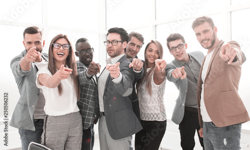 modern business team pointing at you