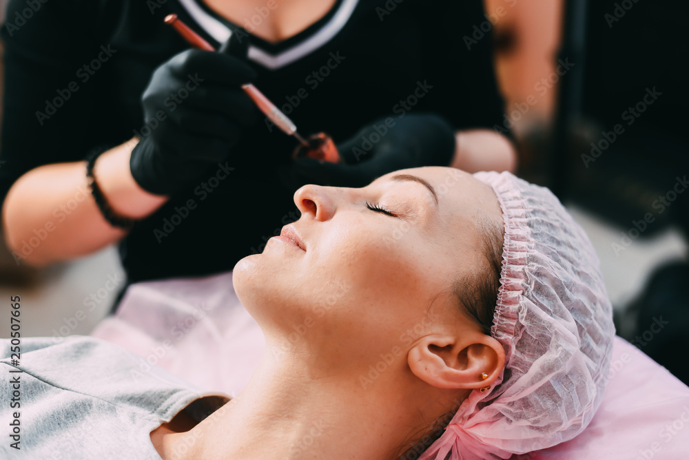 Permanent makeup for red lips, pigment stirring Permanent makeup for red lips, pigment stirring
