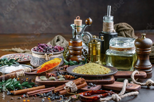 Fototapeta Naklejka Na Ścianę i Meble -  Spices and seasonings for cooking in the composition on the table