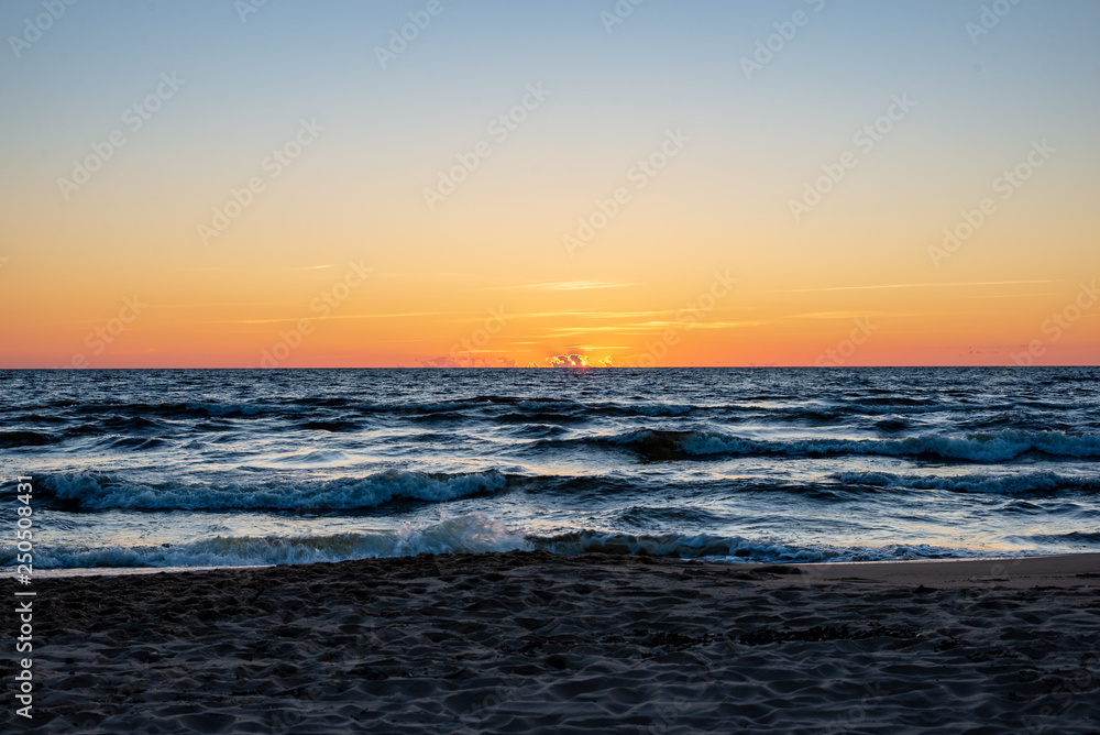colorful sunset on the sea beach in summer colorful sunset on the sea beach in summer