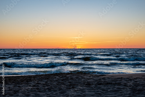 colorful sunset on the sea beach in summer