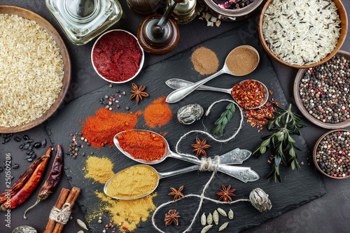 Fototapeta Naklejka Na Ścianę i Meble -  Spices and seasonings for cooking in the composition on the table