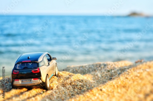 Car model on the beach.