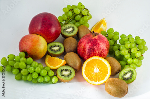 Fototapeta Naklejka Na Ścianę i Meble -  Tropical fruits on a white background, juicy still-life from fruit. Useful fruit for a healthy diet. Mix of different fruits.