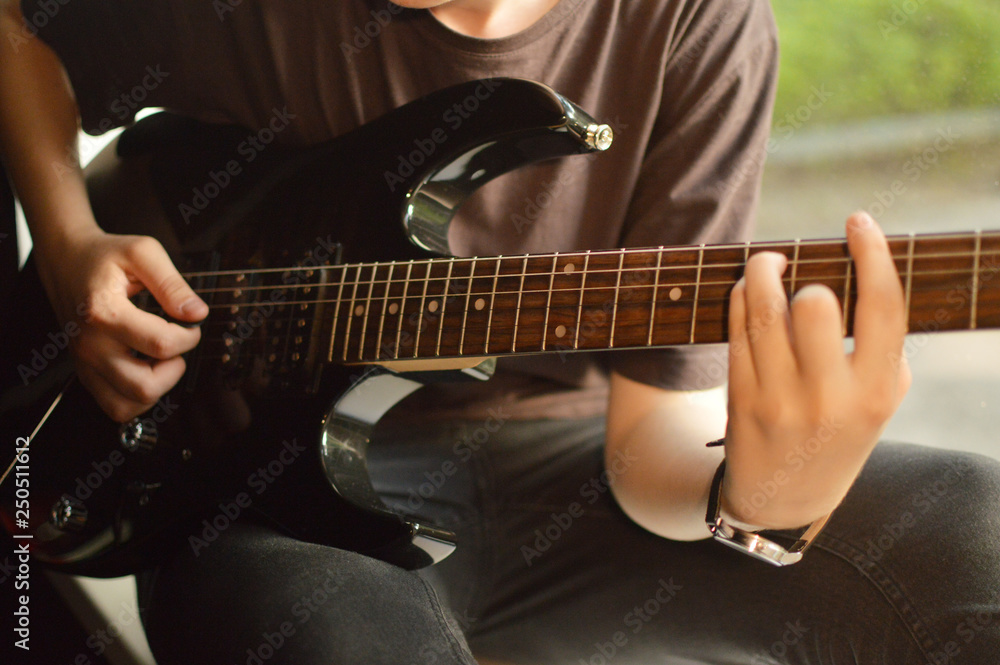 Playing guitar