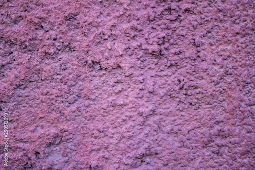 old wall with red plaster.