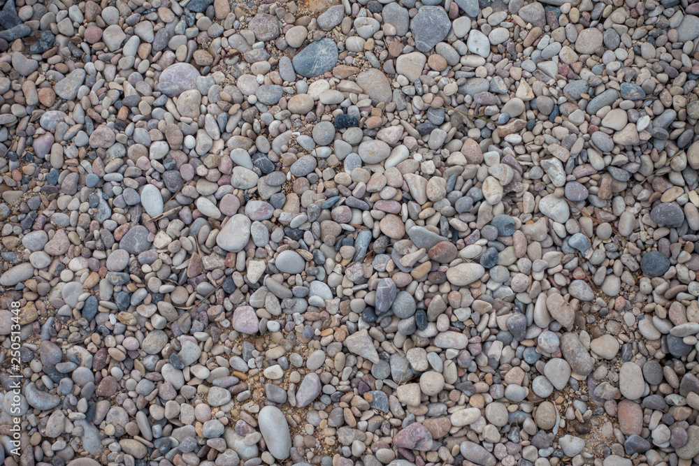 A background with stones of a beach A background with stones of a beach