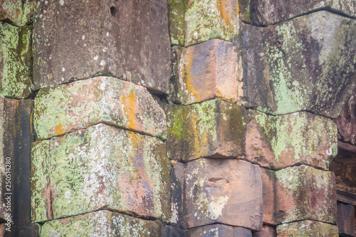 Beautiful sandstone craved on the lintel, doorway and windows of Lord Krishna killing Lion in Bapuan Khmer art at Phra That Narai Cheng Weng, Sakon Nakhon, Thailand. photo