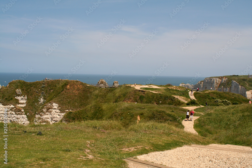 High,chalk cliffs of The France village of Etretat