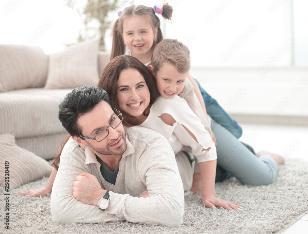 cheerful family relaxes in the living room cheerful family relaxes in the living room