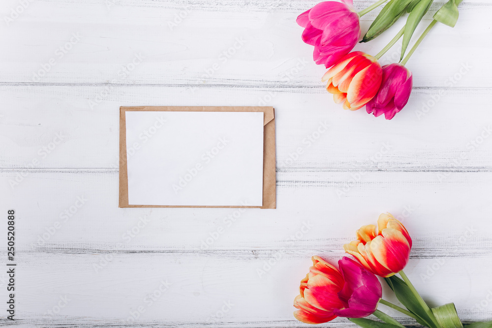 Mother's day concept.Greeting card with tulips on white background. Mother's day concept.Greeting card with tulips on white background.