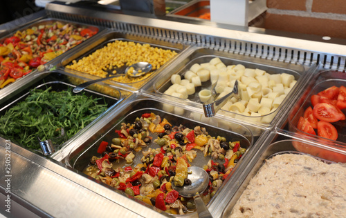 Obraz na plátně self service restaurant with many raw and cooked foods