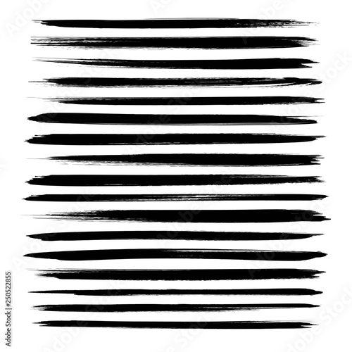 Abstract textured black ink long strokes set isolated on a white background