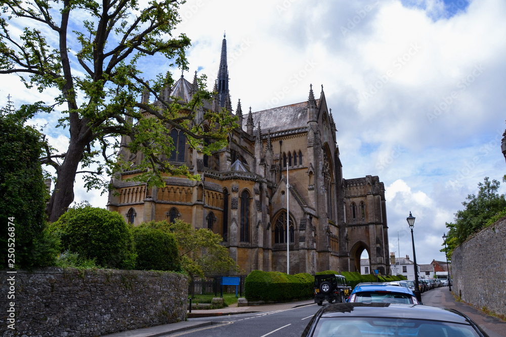 Church walls and windows with blue sky and clouds