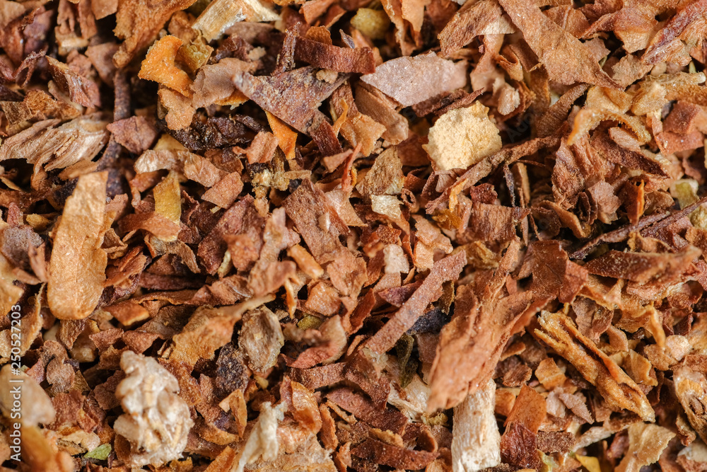 Tobacco from cigarettes as a background. Top view. Close up. Tobacco from cigarettes as a background. Top view. Close up.