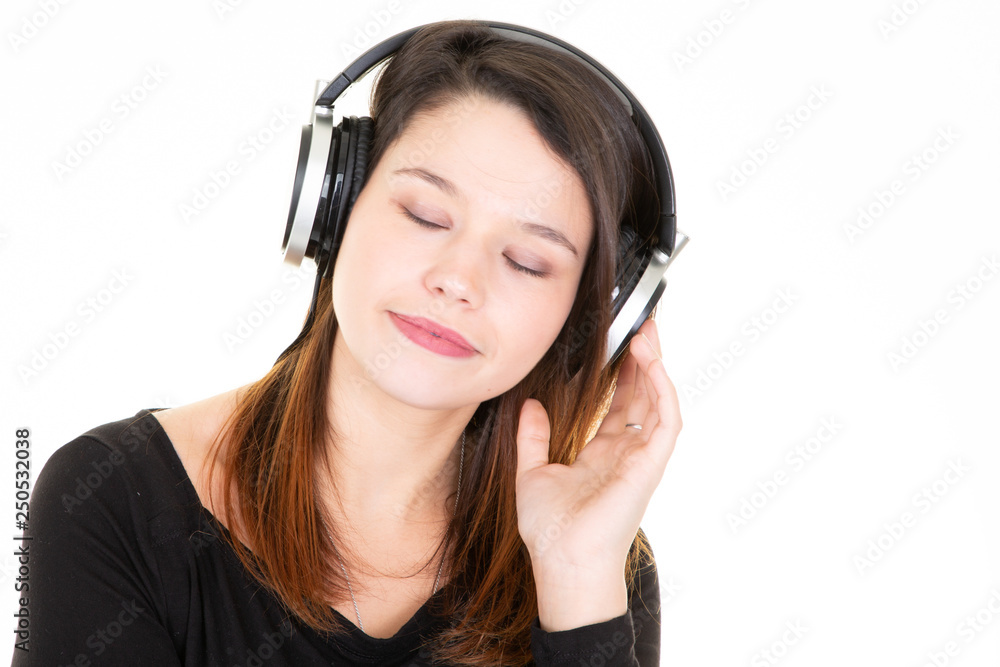 Happy young woman with headphones on a white isolated background Happy young woman with headphones on a white isolated background