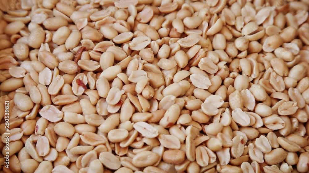 Close up of peanuts. Peanut background. Top view Close up of peanuts. Peanut background. Top view