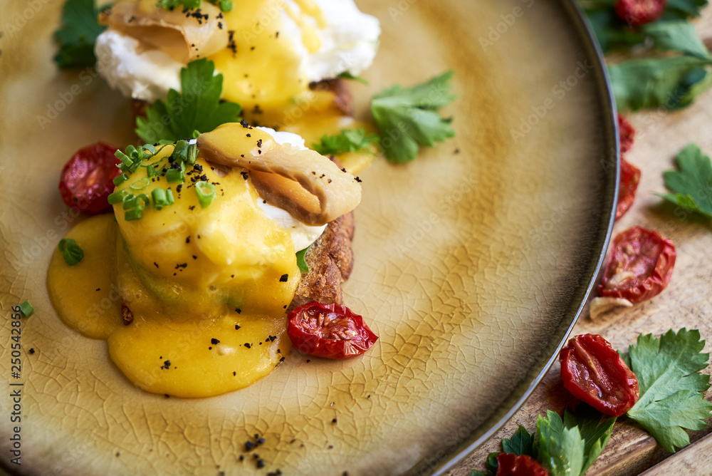 Healthy spring breakfast food with avocado toast, poached egg Healthy spring breakfast food with avocado toast, poached egg