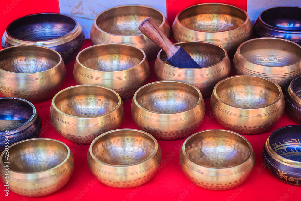 Tibetan singing bowls for sale at the antique market. Singing bowls