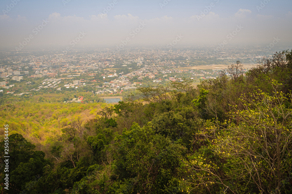 Chiang Mai cityscape view from Doi Suthep hills viewpoint. You can see the 180 degrees of Chiang Mai town under your feet. Chiang Mai is the largest city in northern Thailand. Chiang Mai cityscape view from Doi Suthep hills viewpoint. You can see the 180 degrees of Chiang Mai town under your feet. Chiang Mai is the largest city in northern Thailand.